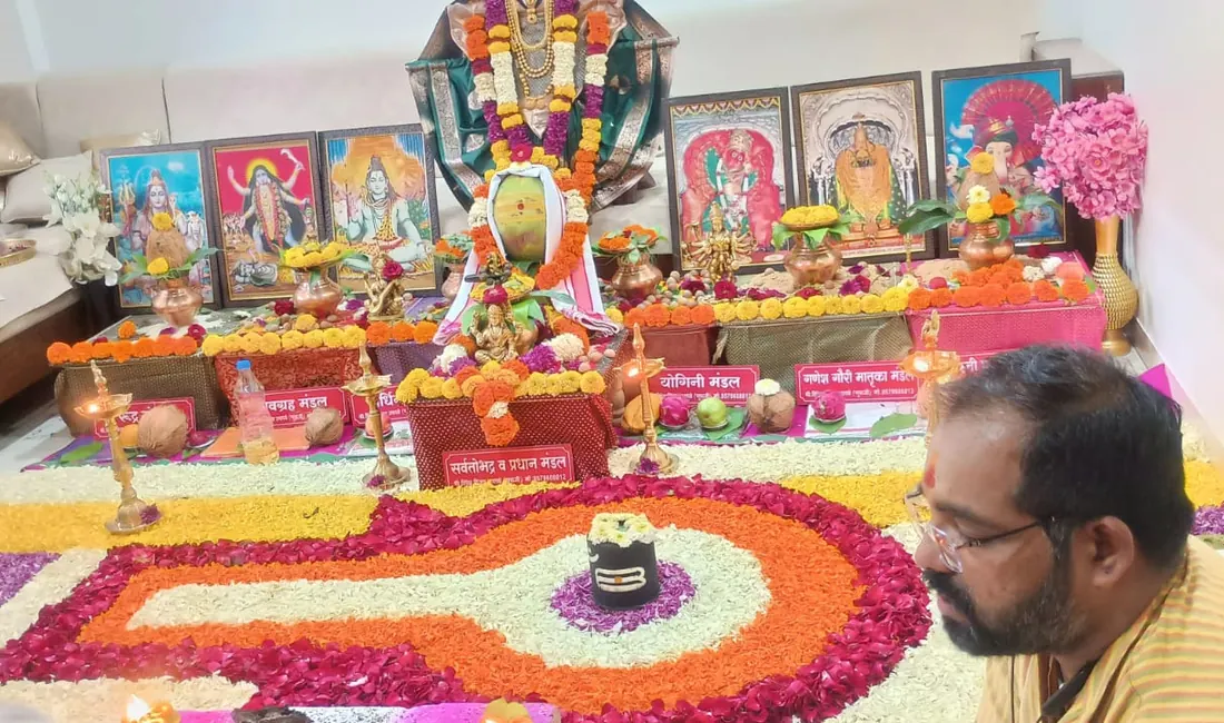 Trimbakeshwar puja arrangement with flowers and havan